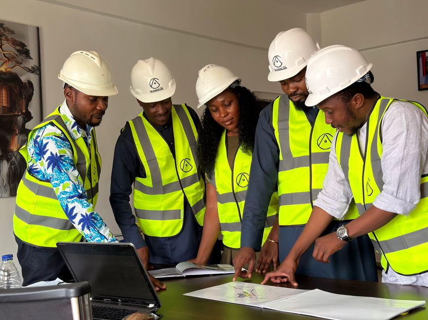 Professional roofing team reviewing site conditions and installation specifications for project planning
