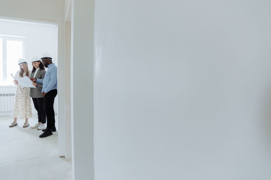 Professional contractor team working on exterior installation